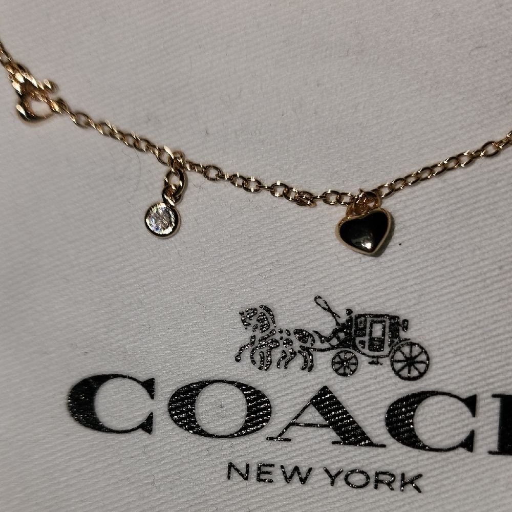 Coach Gold-Tone Delicate Charm Bracelet - Picture 5 of 7